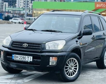 Черный Тойота РАВ 4, объемом двигателя 2 л и пробегом 205 тыс. км за 5900 $, фото 1 на Automoto.ua
