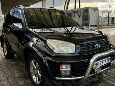 Черный Тойота РАВ 4, объемом двигателя 2 л и пробегом 238 тыс. км за 7500 $, фото 1 на Automoto.ua