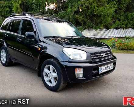 Чорний Тойота РАВ 4, об'ємом двигуна 2 л та пробігом 240 тис. км за 6299 $, фото 1 на Automoto.ua