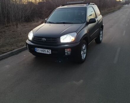 Чорний Тойота РАВ 4, об'ємом двигуна 2 л та пробігом 260 тис. км за 6550 $, фото 1 на Automoto.ua
