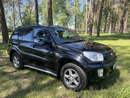 Чорний Тойота РАВ 4, об'ємом двигуна 2 л та пробігом 209 тис. км за 7850 $, фото 1 на Automoto.ua