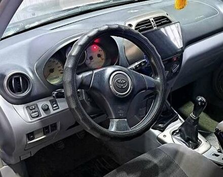 Черный Тойота РАВ 4, объемом двигателя 2 л и пробегом 362 тыс. км за 5500 $, фото 1 на Automoto.ua