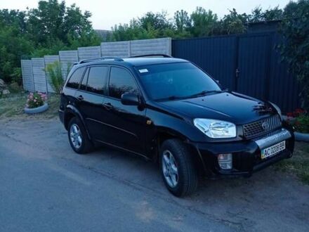 Чорний Тойота РАВ 4, об'ємом двигуна 2 л та пробігом 201 тис. км за 4550 $, фото 1 на Automoto.ua