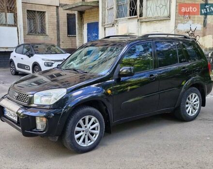 Чорний Тойота РАВ 4, об'ємом двигуна 2 л та пробігом 300 тис. км за 5300 $, фото 1 на Automoto.ua