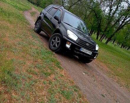 Чорний Тойота РАВ 4, об'ємом двигуна 2 л та пробігом 380 тис. км за 6500 $, фото 1 на Automoto.ua