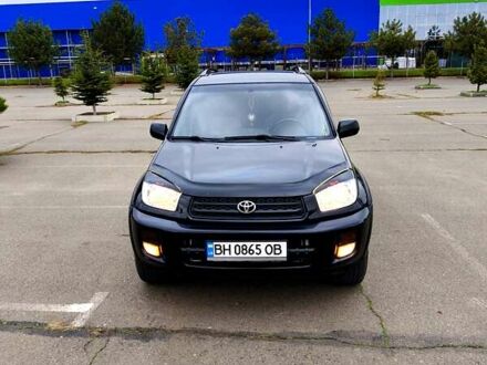 Чорний Тойота РАВ 4, об'ємом двигуна 2 л та пробігом 270 тис. км за 6500 $, фото 1 на Automoto.ua
