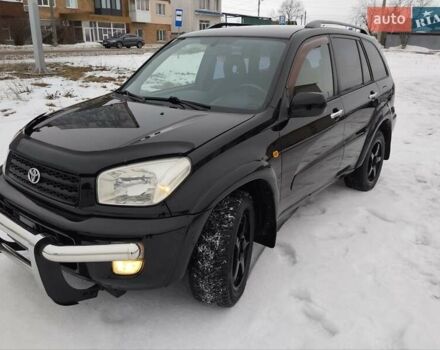 Черный Тойота РАВ 4, объемом двигателя 2 л и пробегом 434 тыс. км за 6300 $, фото 1 на Automoto.ua