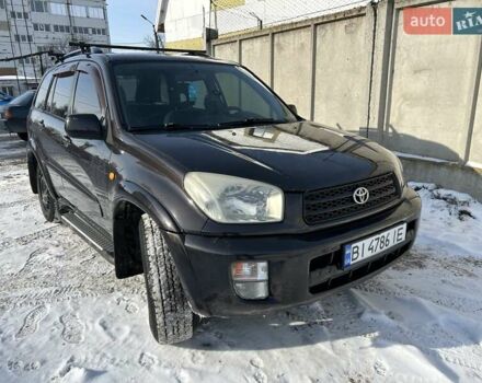 Чорний Тойота РАВ 4, об'ємом двигуна 2 л та пробігом 395 тис. км за 6000 $, фото 1 на Automoto.ua