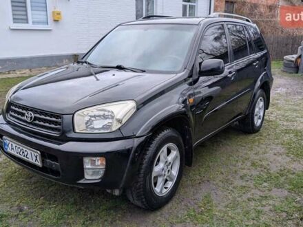 Черный Тойота РАВ 4, объемом двигателя 2 л и пробегом 406 тыс. км за 6000 $, фото 1 на Automoto.ua