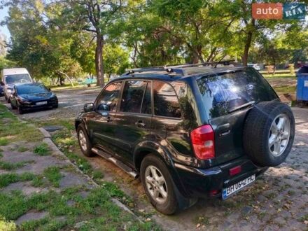 Черный Тойота РАВ 4, объемом двигателя 2 л и пробегом 169 тыс. км за 7300 $, фото 1 на Automoto.ua