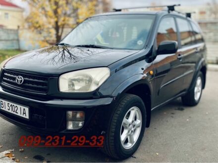 Черный Тойота РАВ 4, объемом двигателя 2 л и пробегом 30 тыс. км за 5000 $, фото 1 на Automoto.ua