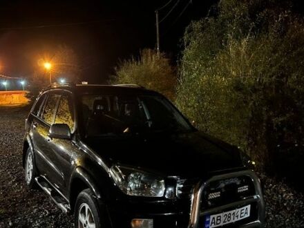 Черный Тойота РАВ 4, объемом двигателя 2 л и пробегом 285 тыс. км за 6000 $, фото 1 на Automoto.ua