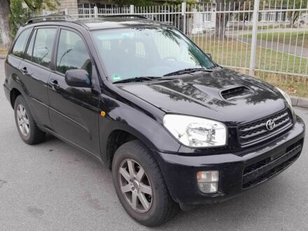 Черный Тойота РАВ 4, объемом двигателя 2 л и пробегом 240 тыс. км за 3700 $, фото 1 на Automoto.ua