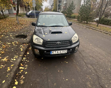 Черный Тойота РАВ 4, объемом двигателя 2 л и пробегом 395 тыс. км за 4200 $, фото 1 на Automoto.ua