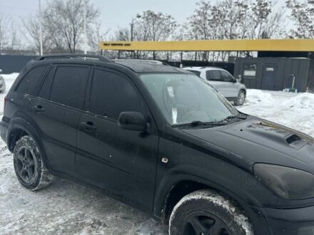 Чорний Тойота РАВ 4, об'ємом двигуна 2 л та пробігом 354 тис. км за 7000 $, фото 1 на Automoto.ua