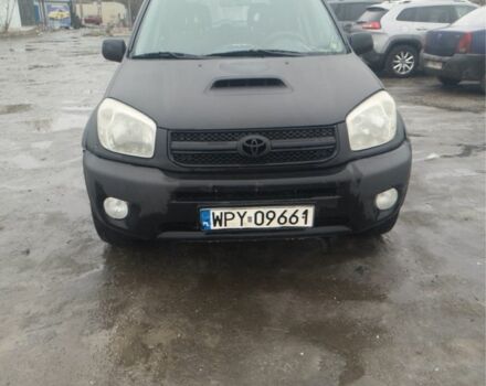 Черный Тойота РАВ 4, объемом двигателя 2 л и пробегом 380 тыс. км за 4000 $, фото 1 на Automoto.ua