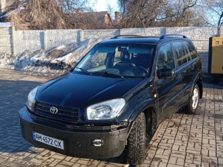 Чорний Тойота РАВ 4, об'ємом двигуна 2 л та пробігом 120 тис. км за 5777 $, фото 1 на Automoto.ua