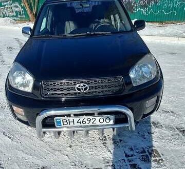 Чорний Тойота РАВ 4, об'ємом двигуна 2 л та пробігом 240 тис. км за 6700 $, фото 1 на Automoto.ua
