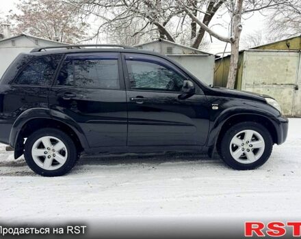Черный Тойота РАВ 4, объемом двигателя 2 л и пробегом 210 тыс. км за 7300 $, фото 1 на Automoto.ua