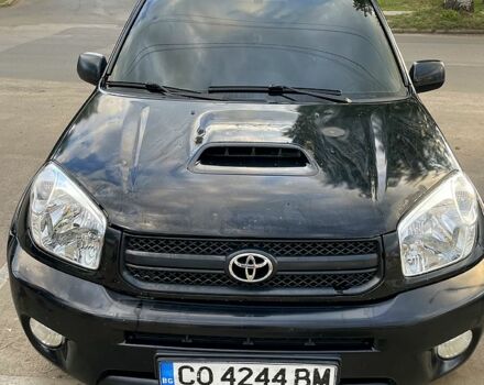 Черный Тойота РАВ 4, объемом двигателя 2 л и пробегом 250 тыс. км за 4800 $, фото 1 на Automoto.ua