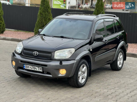 Черный Тойота РАВ 4, объемом двигателя 2 л и пробегом 230 тыс. км за 7850 $, фото 1 на Automoto.ua