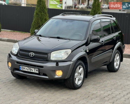 Чорний Тойота РАВ 4, об'ємом двигуна 2 л та пробігом 230 тис. км за 7850 $, фото 1 на Automoto.ua