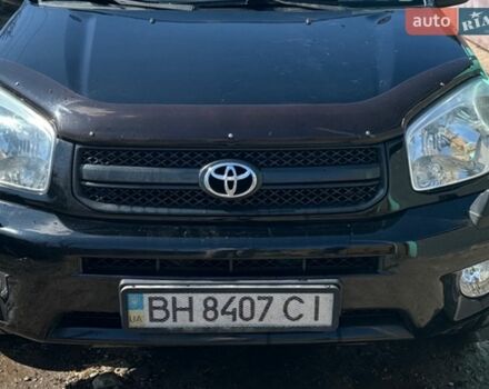 Черный Тойота РАВ 4, объемом двигателя 2 л и пробегом 234 тыс. км за 7500 $, фото 1 на Automoto.ua