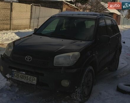 Черный Тойота РАВ 4, объемом двигателя 2 л и пробегом 313 тыс. км за 7200 $, фото 1 на Automoto.ua