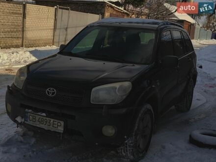 Черный Тойота РАВ 4, объемом двигателя 2 л и пробегом 313 тыс. км за 6800 $, фото 1 на Automoto.ua