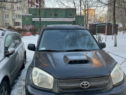 Черный Тойота РАВ 4, объемом двигателя 2 л и пробегом 286 тыс. км за 3000 $, фото 1 на Automoto.ua