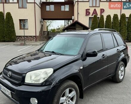 Черный Тойота РАВ 4, объемом двигателя 2 л и пробегом 219 тыс. км за 6350 $, фото 1 на Automoto.ua