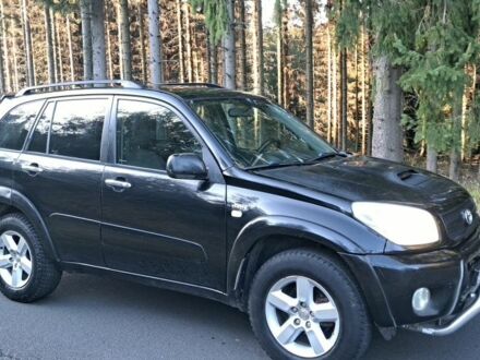 Чорний Тойота РАВ 4, об'ємом двигуна 2 л та пробігом 320 тис. км за 4211 $, фото 1 на Automoto.ua