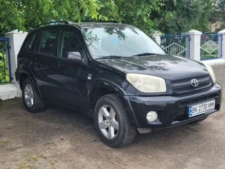 Чорний Тойота РАВ 4, об'ємом двигуна 2 л та пробігом 193 тис. км за 7600 $, фото 1 на Automoto.ua