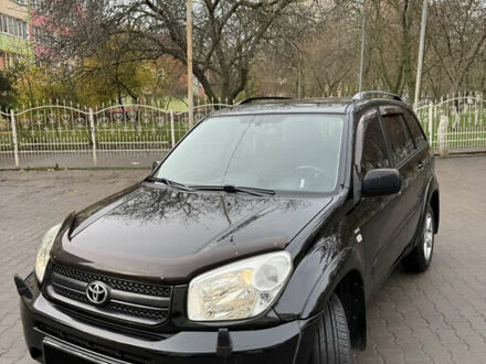 Черный Тойота РАВ 4, объемом двигателя 2 л и пробегом 230 тыс. км за 6500 $, фото 1 на Automoto.ua