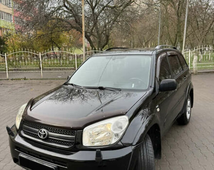 Черный Тойота РАВ 4, объемом двигателя 2 л и пробегом 230 тыс. км за 6500 $, фото 1 на Automoto.ua