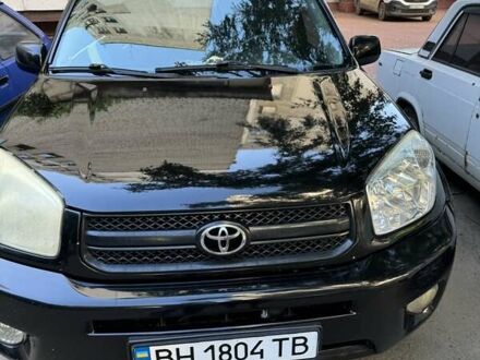 Черный Тойота РАВ 4, объемом двигателя 2 л и пробегом 279 тыс. км за 7000 $, фото 1 на Automoto.ua