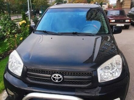 Чорний Тойота РАВ 4, об'ємом двигуна 2 л та пробігом 504 тис. км за 5700 $, фото 1 на Automoto.ua