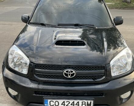 Черный Тойота РАВ 4, объемом двигателя 2 л и пробегом 250 тыс. км за 4800 $, фото 1 на Automoto.ua
