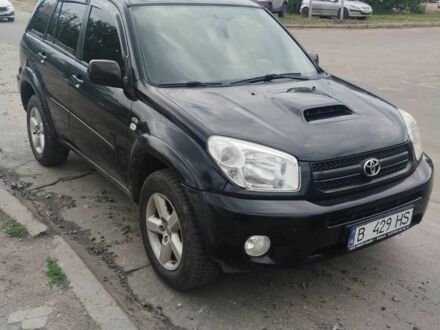 Черный Тойота РАВ 4, объемом двигателя 2 л и пробегом 195 тыс. км за 5582 $, фото 1 на Automoto.ua