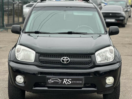 Черный Тойота РАВ 4, объемом двигателя 2 л и пробегом 243 тыс. км за 6900 $, фото 1 на Automoto.ua