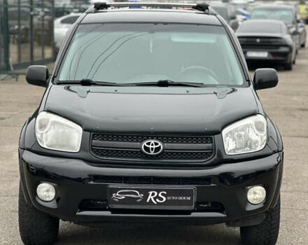 Чорний Тойота РАВ 4, об'ємом двигуна 2 л та пробігом 243 тис. км за 6900 $, фото 1 на Automoto.ua