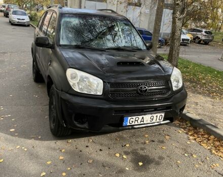 Чорний Тойота РАВ 4, об'ємом двигуна 2 л та пробігом 300 тис. км за 3600 $, фото 1 на Automoto.ua