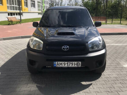 Чорний Тойота РАВ 4, об'ємом двигуна 2 л та пробігом 200 тис. км за 5600 $, фото 1 на Automoto.ua