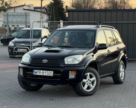 Черный Тойота РАВ 4, объемом двигателя 2 л и пробегом 260 тыс. км за 2400 $, фото 1 на Automoto.ua