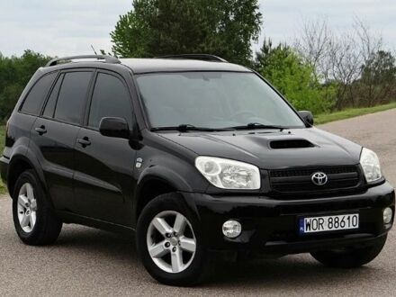 Черный Тойота РАВ 4, объемом двигателя 2 л и пробегом 210 тыс. км за 2600 $, фото 1 на Automoto.ua