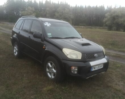 Чорний Тойота РАВ 4, об'ємом двигуна 2 л та пробігом 300 тис. км за 3500 $, фото 1 на Automoto.ua