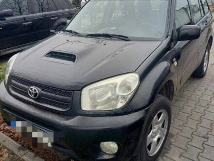 Черный Тойота РАВ 4, объемом двигателя 2 л и пробегом 297 тыс. км за 3800 $, фото 1 на Automoto.ua