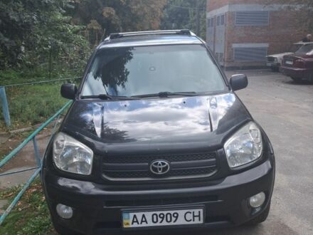 Чорний Тойота РАВ 4, об'ємом двигуна 2 л та пробігом 319 тис. км за 5700 $, фото 1 на Automoto.ua