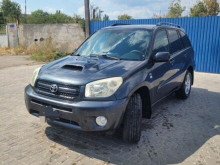 Черный Тойота РАВ 4, объемом двигателя 2 л и пробегом 330 тыс. км за 4350 $, фото 1 на Automoto.ua