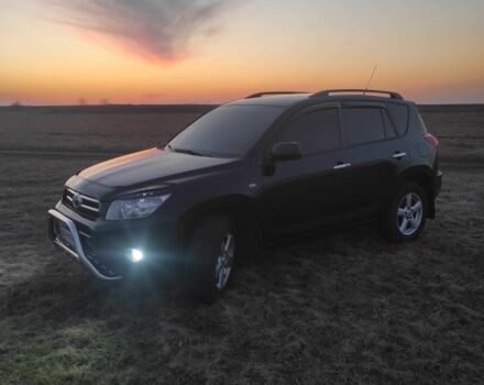 Черный Тойота РАВ 4, объемом двигателя 2 л и пробегом 242 тыс. км за 9000 $, фото 1 на Automoto.ua